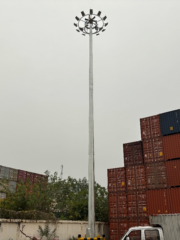 High lighting poles with lifting system